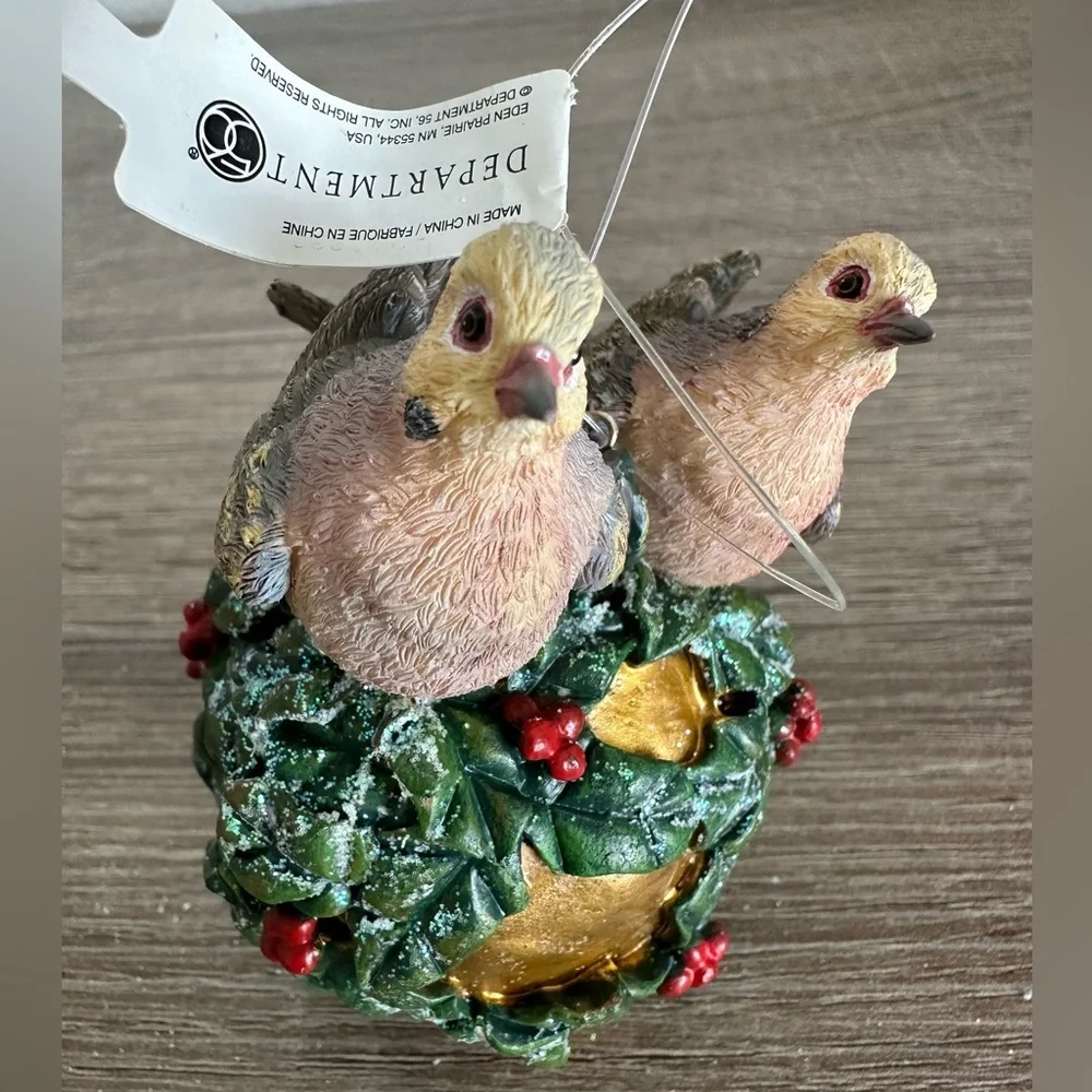 Decorative Bird Ornament with Green and Gold Accents